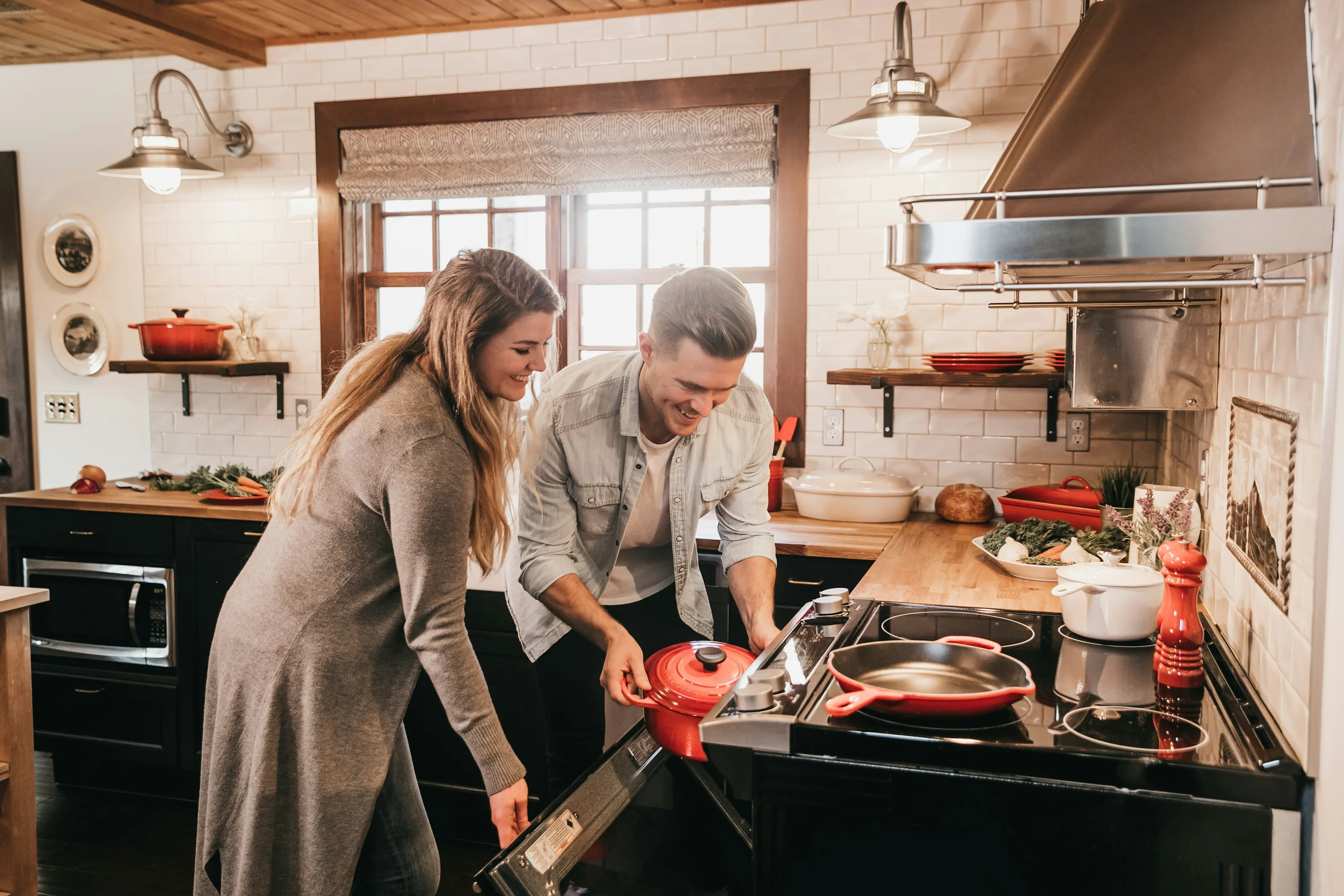 A couple preparing a colourful, healthy meal together at home